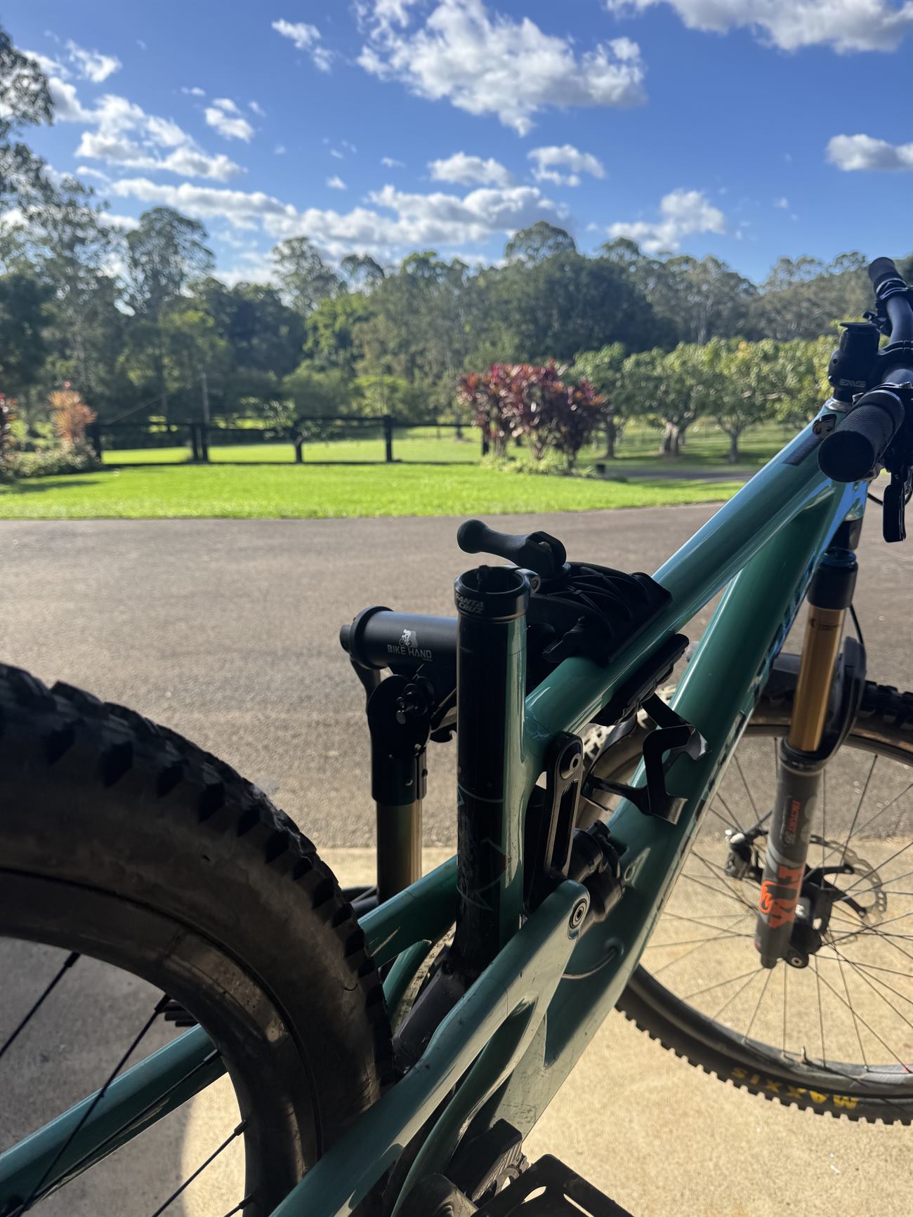 Close up of fork, shock and drivetrain on a trail bike