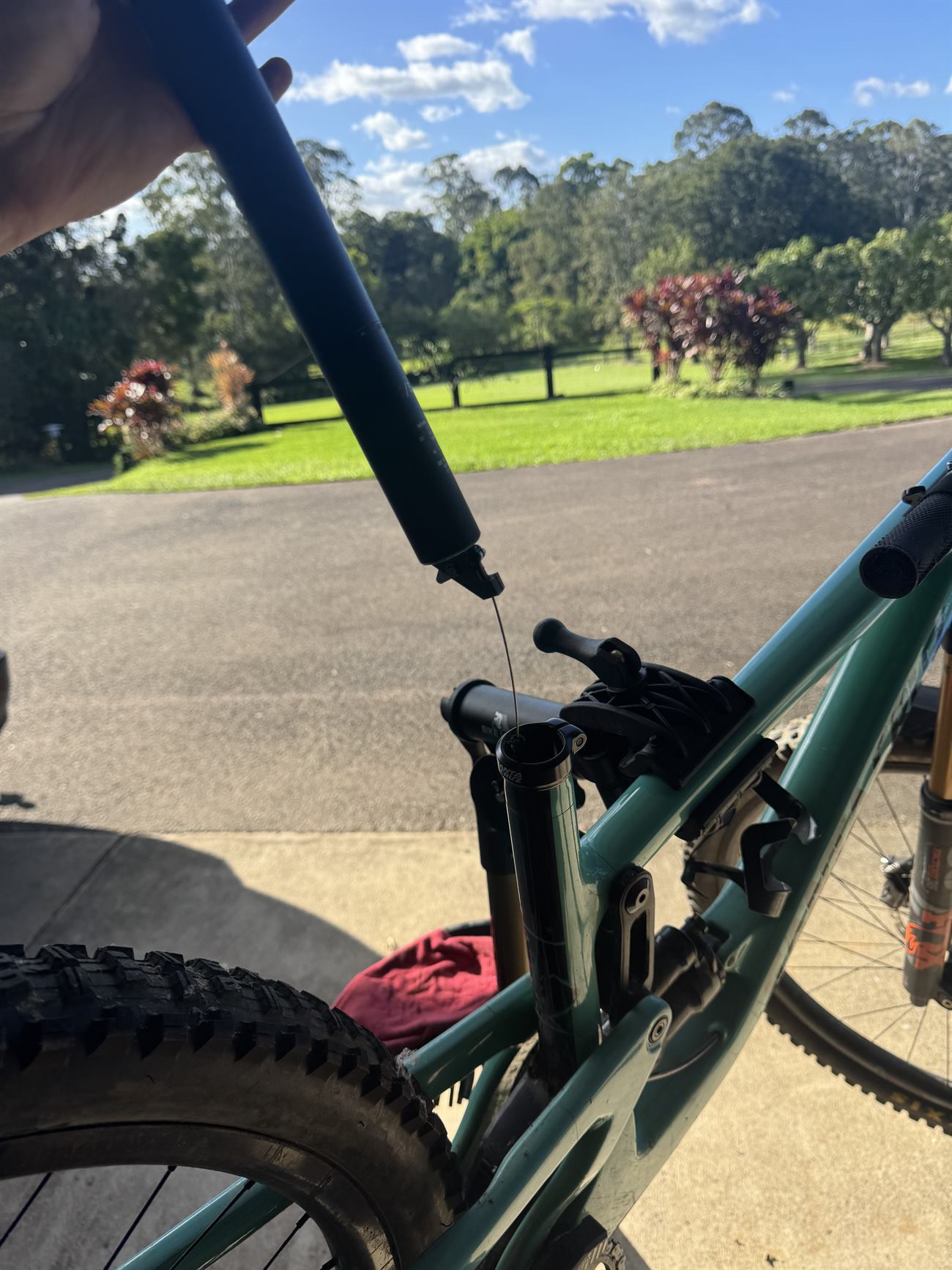 Shock pump attached to a rear shock, setting sag